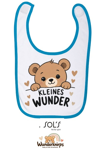 Baby-Lätzchen SOL’S Babib in Weiß / Aqua mit Motiv Kleines Wunder – Bär