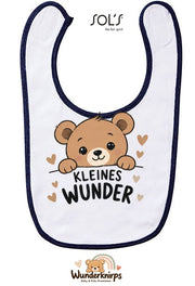 Baby-Lätzchen SOL’S Babib in Weiß / Marineblau mit Motiv Kleines Wunder – Bär