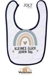 Baby-Lätzchen SOL’S Babib in Weiß / Marineblau mit Motiv Kleines Glück – Regenbogen