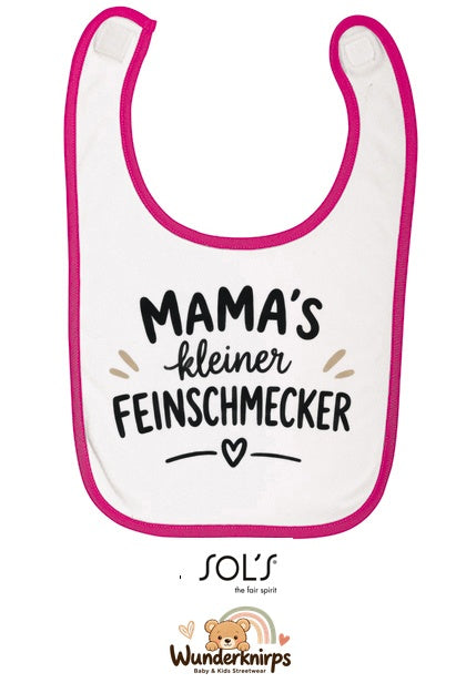 Baby-Lätzchen SOL’S Babib in Weiß / Fuchsia mit Motiv Mamas kleiner Feinschmecker