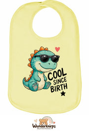 Baby-Lätzchen Olli-01 in Pastellgelb mit Motiv Cool since Birth – Dino