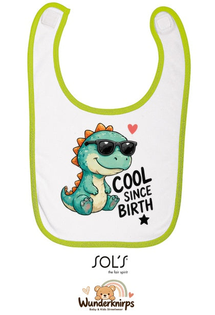 Baby-Lätzchen SOL’S Babib in Weiß / Apfelgrün mit Motiv Cool since Birth – Dino