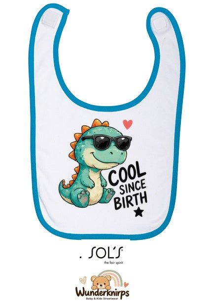 Baby-Lätzchen SOL’S Babib in Weiß / Aqua mit Motiv Cool since Birth – Dino
