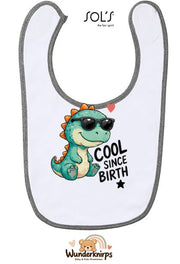Baby-Lätzchen SOL’S Babib in Weiß / Grau meliert mit Motiv Cool since Birth – Dino