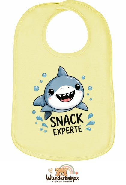 Baby-Lätzchen Olli-01 in Pastellgelb mit Motiv Snack-Experte – Hai