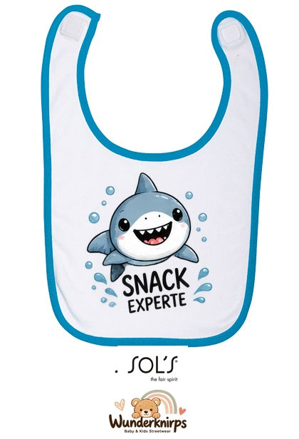 Baby-Lätzchen SOL’S Babib in Weiß / Aqua mit Motiv Snack-Experte – Hai