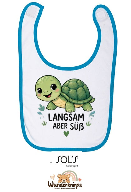 Baby-Lätzchen SOL’S Babib in Weiß / Aqua mit Motiv Langsam, aber süß – Schildkröte