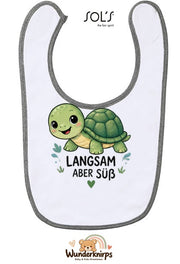 Baby-Lätzchen SOL’S Babib in Weiß / Grau meliert mit Motiv Langsam, aber süß – Schildkröte