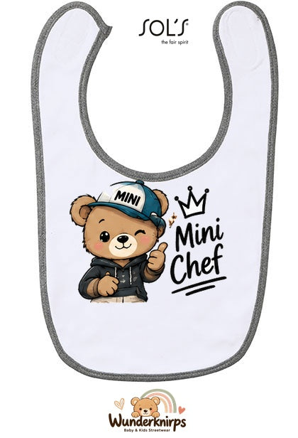 Baby-Lätzchen SOL’S Babib in Weiß / Grau meliert mit Motiv Mini Chef – Bär
