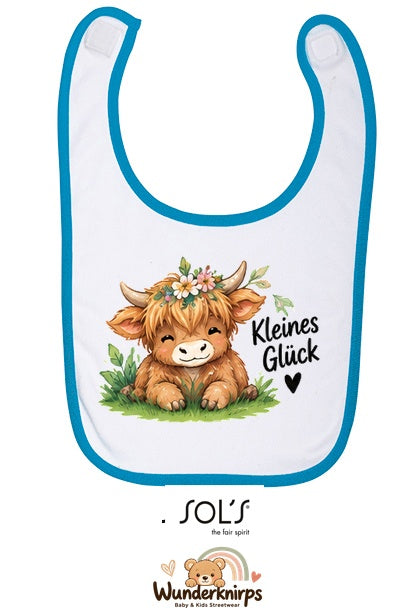Baby-Lätzchen SOL’S Babib in Weiß / Aqua mit Motiv Kleines Glück – Hochlandrind