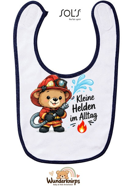 Baby-Lätzchen SOL’S Babib in Weiß / Marineblau mit Motiv Kleine Helden im Alltag