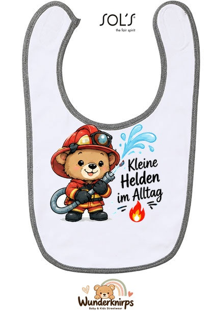 Baby-Lätzchen SOL’S Babib in Weiß / Grau meliert mit Motiv Kleine Helden im Alltag