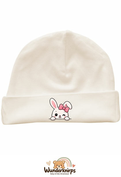 Umschlagmütze Rox-01 in Natur mit Motiv Hase mit rosa Schleife