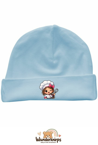 Umschlagmütze Rox-01 in Pastellblau mit Motiv Köchin mit Schneebesen