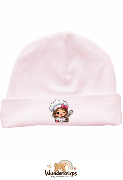 Umschlagmütze Rox-01 in Pastellrosa mit Motiv Köchin mit Schneebesen