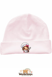 Umschlagmütze Rox-01 in Pastellrosa mit Motiv Köchin mit Schneebesen