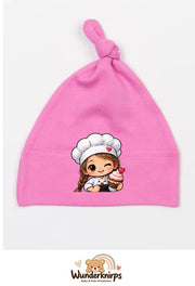 Knotenmütze Babybugz BZ15 in Bubblegum-Pink mit Motiv Bäckerin mit Cupcake