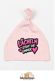 Knotenmütze Babybugz BZ15 in Pastellrosa mit Motiv Lächeln steht dir immer