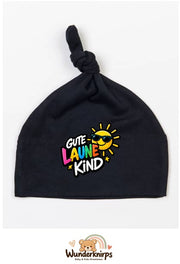 Knotenmütze Babybugz BZ15 in Schwarz mit Motiv Gute-Laune-Kind
