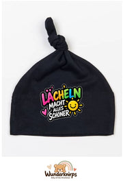 Knotenmütze Babybugz BZ15 in Schwarz mit Motiv Lächeln macht alles schöner