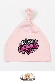 Knotenmütze Babybugz BZ15 in Pastellrosa mit Motiv Du bist einzigartig