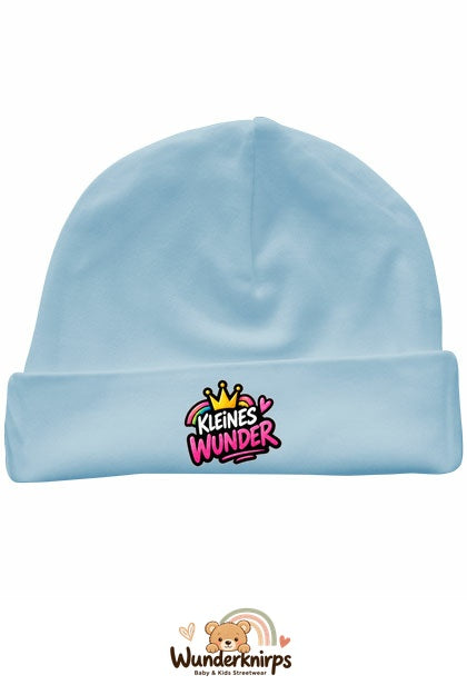 Umschlagmütze Rox-01 in Pastellblau mit Motiv Kleines Wunder mit Regenbogen
