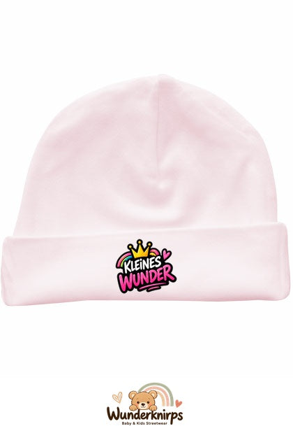 Umschlagmütze Rox-01 in Pastellrosa mit Motiv Kleines Wunder mit Regenbogen