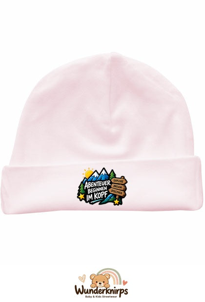 Umschlagmütze Rox-01 in Pastellrosa mit Motiv Abenteuer beginnen im Kopf