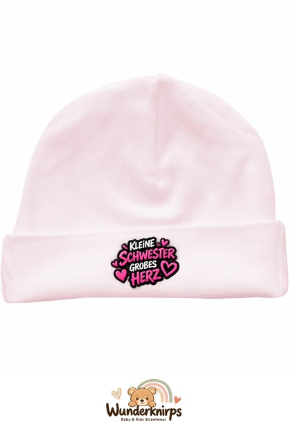 Umschlagmütze Rox-01 in Pastellrosa mit Motiv Kleine Schwester, großes Herz