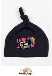 Knotenmütze Babybugz BZ15 in Schwarz mit Motiv Lächeln macht die Welt bunter