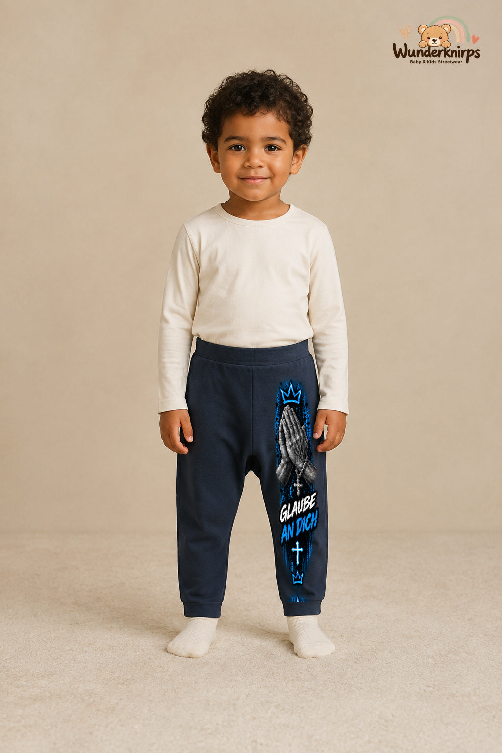 Glaube an dich: Hände für kleine Entdecker – Babyhose für Jungen: Navy mit Hände-Druck am Hosenbein – Wunderknirps.