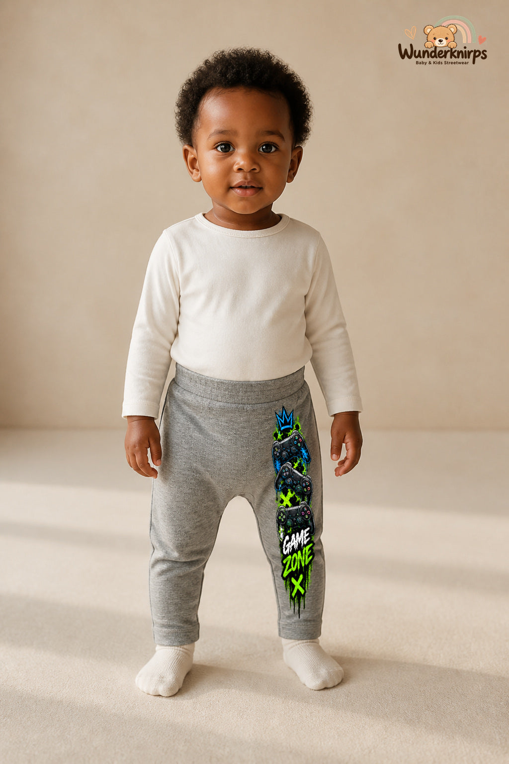 Game zone – Controller mit Persönlichkeit – Babyhose für Mädchen: Grau meliert mit Controller-Druck am Hosenbein – Wunderknirps.