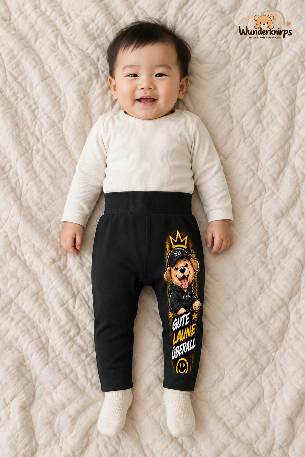Gute laune überall: Hund für kleine Entdecker – Babyhose für Jungen: Schwarz mit Hund-Druck am Hosenbein – Wunderknirps.