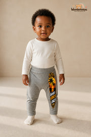 Good vibes only – Palmen mit Persönlichkeit – Babyhose für Mädchen: Grau meliert mit Palmen-Druck am Hosenbein – Wunderknirps.