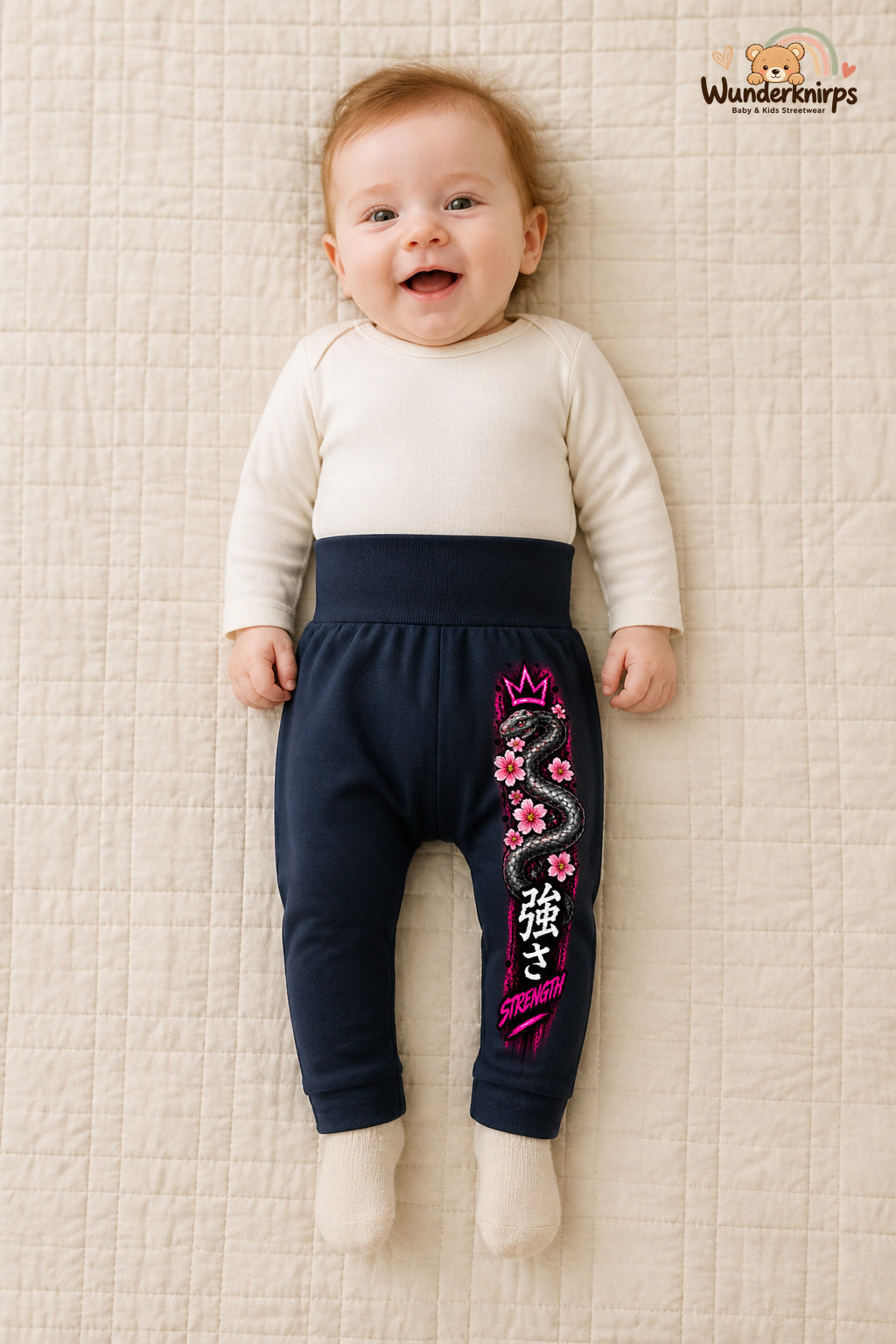Schlange Traumlook – Strength – Babyhose für Mädchen: Navy mit Schlange-Druck am Hosenbein – Wunderknirps.