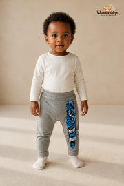 Schlange Traumlook – Trust your process – Babyhose für Mädchen: Grau meliert mit Schlange-Druck am Hosenbein – Wunderknirps.