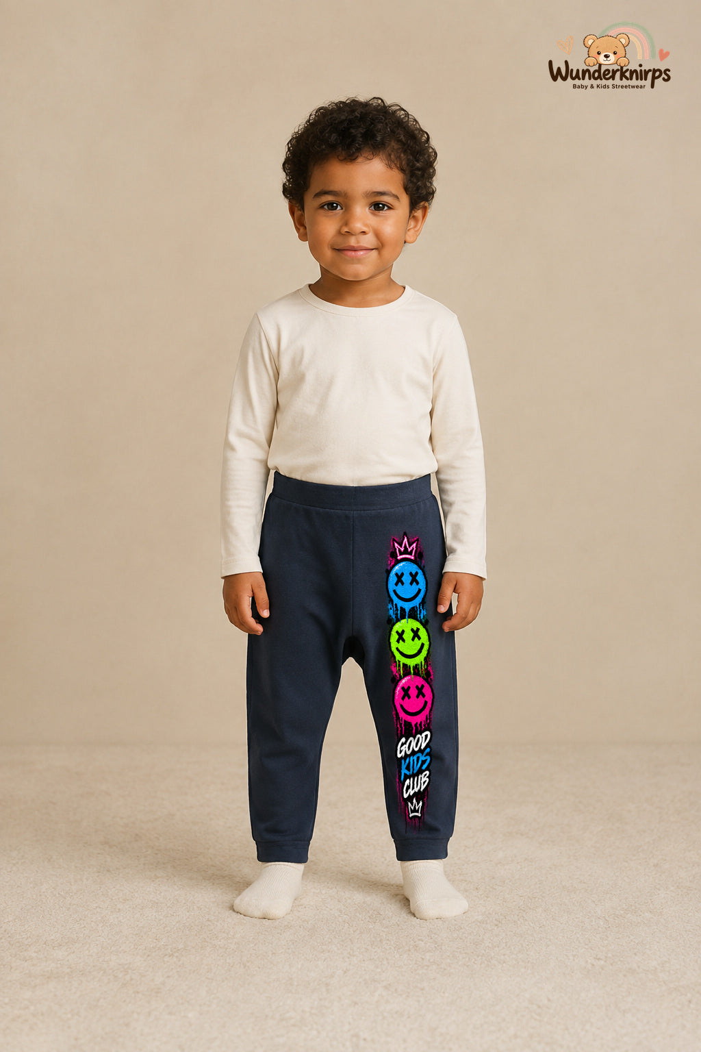 Good kids club – Babyhose mit dem Motiv Smileys – für Jungen: Navy mit Smileys-Druck am Hosenbein – Wunderknirps.