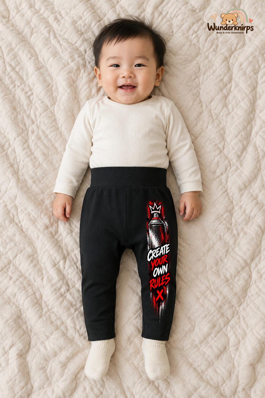 Create your own rules: Spraydose für kleine Entdecker – Babyhose für Jungen: Schwarz mit Spraydose-Druck am Hosenbein – Wunderknirps.